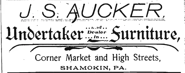 Historic display advertisement for J. S. Aucker, undertaking and furniture.