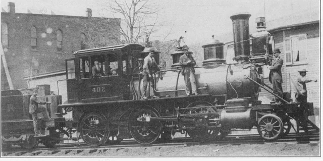 Historic black-and-white photograph of a Reading railroad engine on Water Street in Shamokin