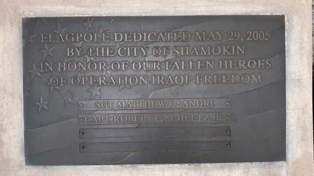City Hall flagpole plaque dedicated to Shamokin's fallen heroes of Operation Iraqi Freedom