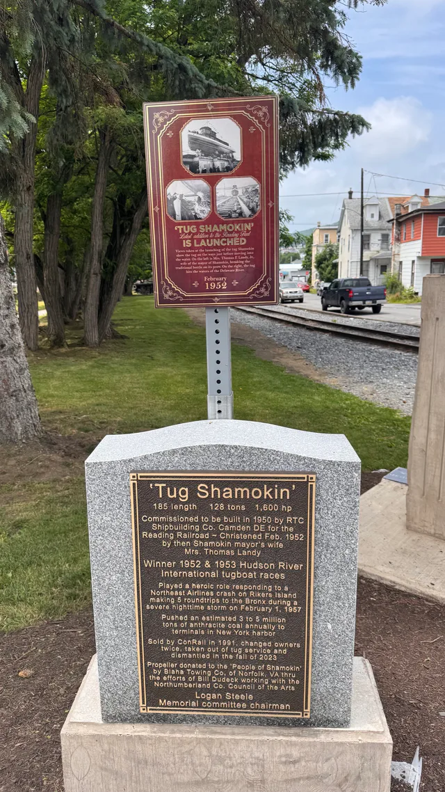 Tug Shamokin history plaque beside the preserved propeller
