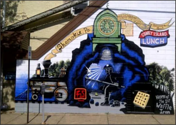 Painted Shamokin History Mural with coal, rail, industry, and community scenes