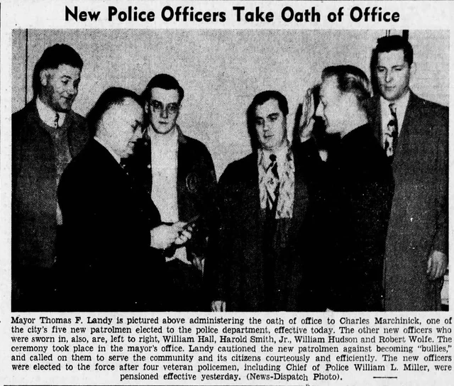 Mayor Thomas F. Landy administering an oath to a new Shamokin patrolman, with four other officers standing nearby and the original newspaper caption below.