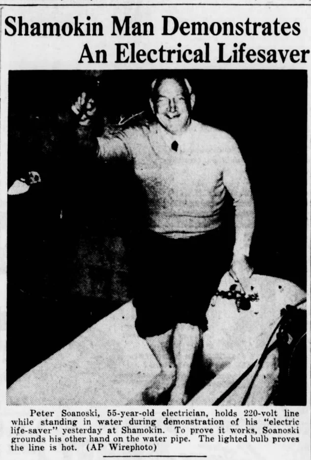 Historic newspaper photograph of inventor Peter A. Sosnoski during an electrical-device demonstration, with its original heading and caption retained.